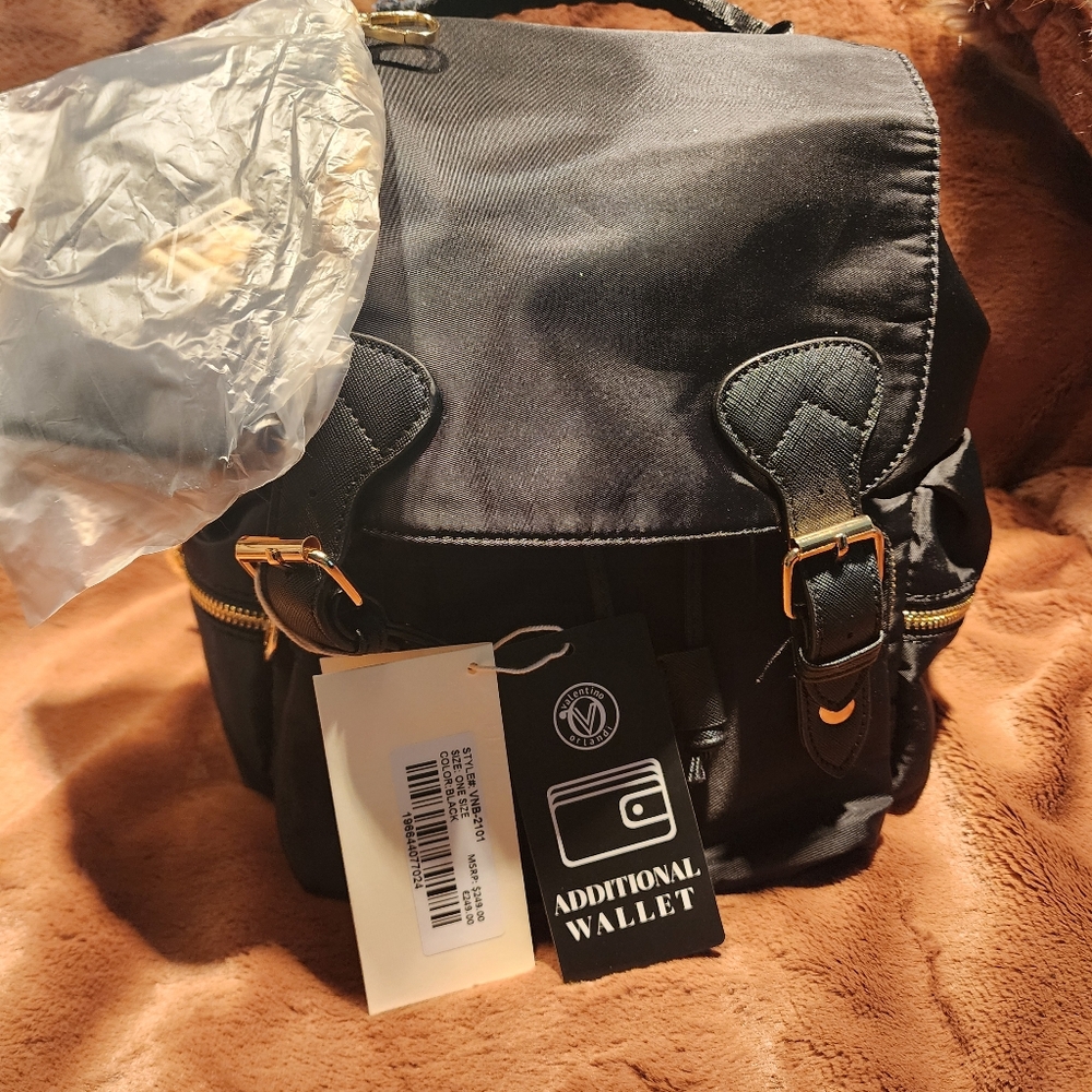 Compact Black Backpack with Durable Design